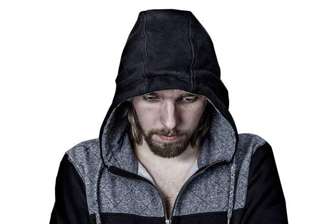 Man feeling guilty wearing a hoody